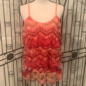 Flirty oranges and reds ruffled top